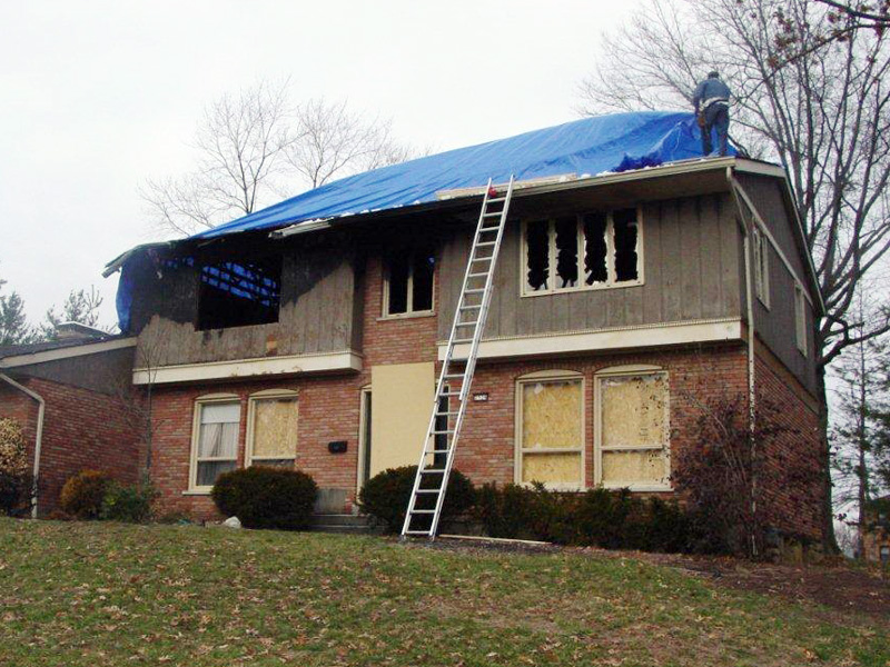 board up and tarp